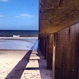 Runway (i): Under-view of a coastal defence structure at Swanage Bay.